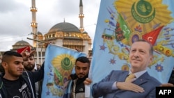 TURKEY - Supporters of Turkish President Recep Tayyip Erdogan celebrate near Taksim Mosque at the Taksim Square in Istanbul on the day of the presidential runoff vote in Istanbul, May 28, 2023.