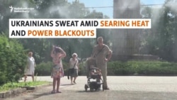 Ukrainians Sweat Amid Searing Heat And Power Blackouts