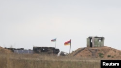 Armenia- A view shows Armenian border guard post next to the Azerbaijani border guard post on the road leading from Armenia to Nagorno-Karabakh, September 21, 2023.