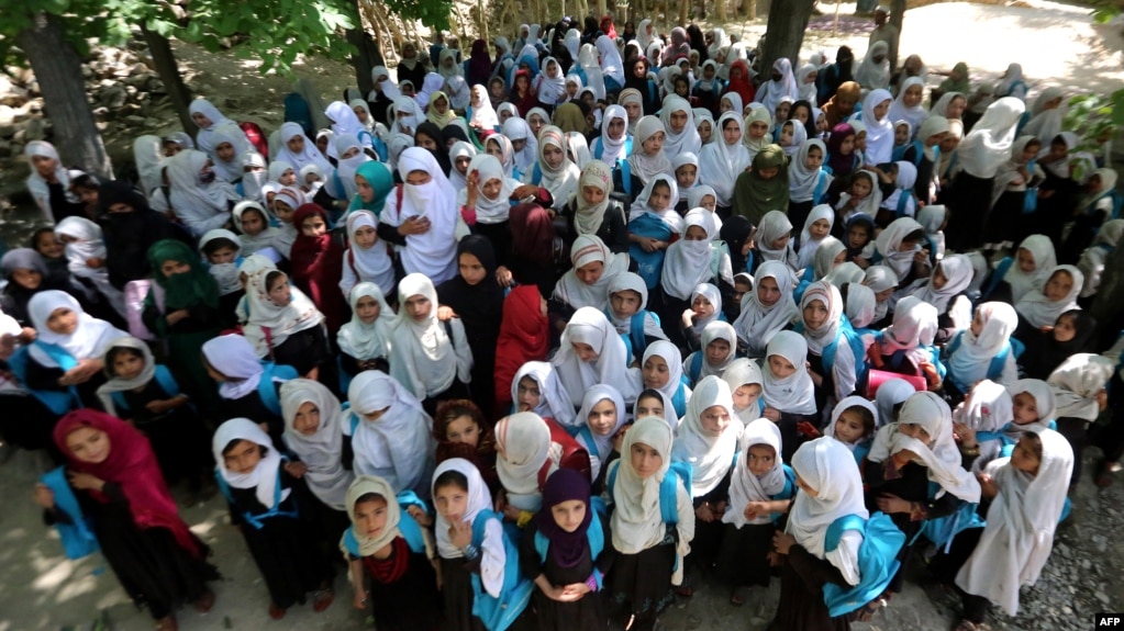 Afghan schoolgirls attend an open-air primary school in Khogyani, a district in eastern Nangarhar Province. (file photo)