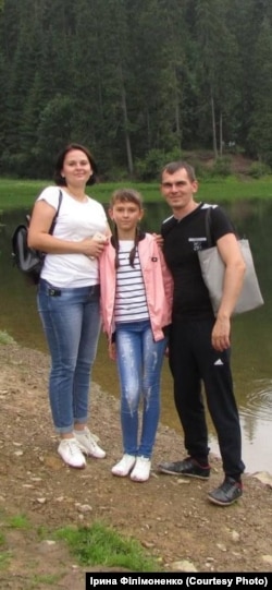 Яна та Олександр Фігурні з донькою Анею
