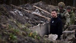
Ukrainian President Volodymyr Zelenskiy inspects an outpost of the State Border Service on the border with Russia during a tour of the Sumy region on March 28.
