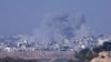 Smoke billows during an Israeli bombardment of the Gaza Strip on November 18.