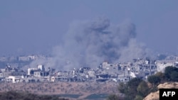 Smoke billows during an Israeli bombardment of the Gaza Strip on November 18.