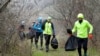 Runners from Moldova run with garbage in their hands colected in Old Orhei nature reserve
