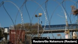 Ilustracija: Nadzor na obali reke Rio Grande u SAD, januar 2024. 