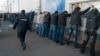 Облава полиции на мигрантов на складе сельхозпродукции в Москве, 2013 