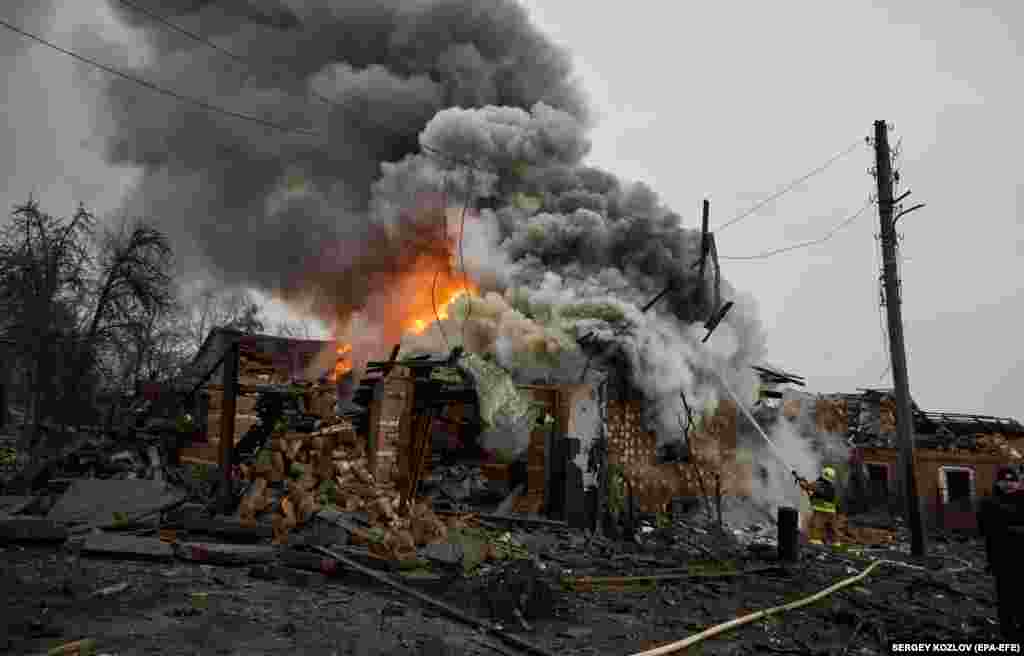 The onslaught on Kharkiv (pictured) damaged 30 apartment buildings as rescuers worked throughout the morning to extinguish fires and search for people trapped in the rubble.