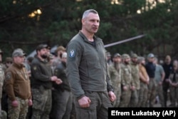 Kyiv Mayor Vitali Klitschko speaks to members of National Guard's 3rd Svoboda (Liberty) Battalion, Rubezh (Frontier) Brigade during rotation in the Kyiv region on April 11.