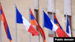 Armenia - Armenian and French flags fly outside the Defense Ministry building in Yerevan, February 23, 2024.