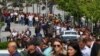 Люди стоять у черзі біля виборчої дільниці, Анкара, Туреччина, 14 травня 2023 року