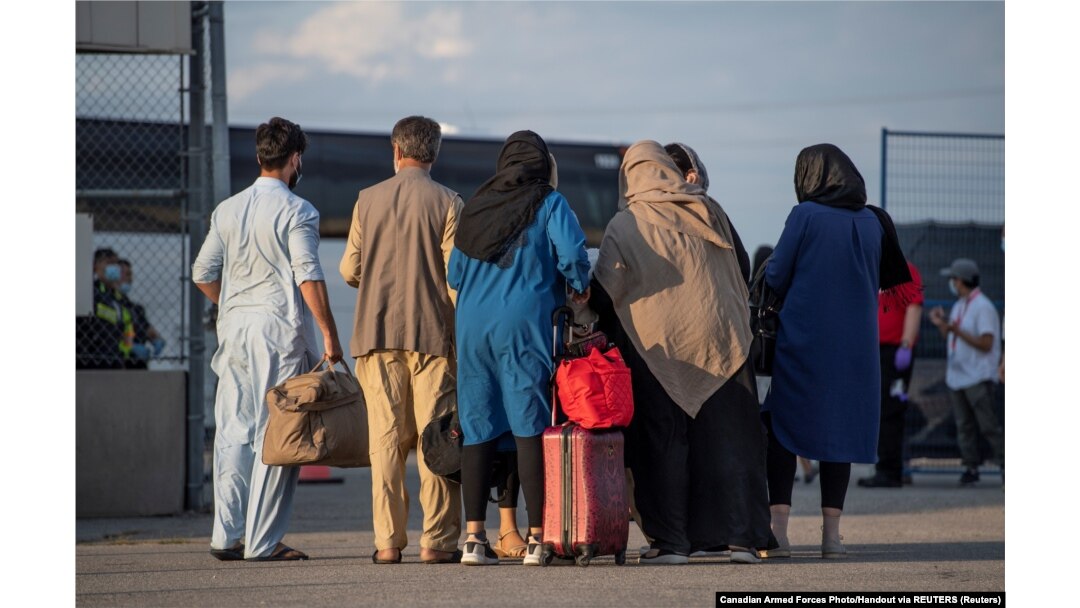 A group of Afghan refugees arrive in Toronto Pearson International Airport, Canada. in August 2021.