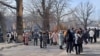 Almaty residents gather in the street after an earthquake on March 4. 