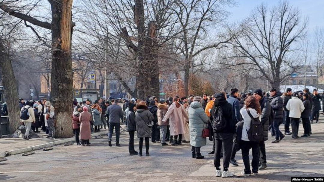 Almaty residents gather in the street after an earthquake on March 4. 