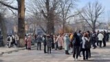 Almaty residents gather in the street after an earthquake on March 4. 