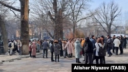 Almaty residents gather in the street after an earthquake on March 4. 