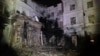 Një ndërtesë e goditur nga sulmet ruse në Harkiv në janar të vitit 2024. Fotografi ilustruese nga arkivi.
