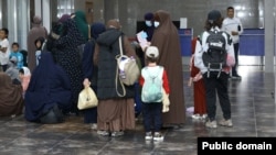 Kyrgyz women and children return to Kyrgyzstan from Syria in August 2023. 