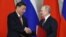 Си Дзинпин и Владимир Путин в Москва
