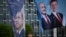 Transparent sa likom turskog predsednika Erdoana (levo) i njegovog izbornog protivkandidata Kiličdarolua (drugi s desna) u Istanbulu, Turska, 12. maj 2023.