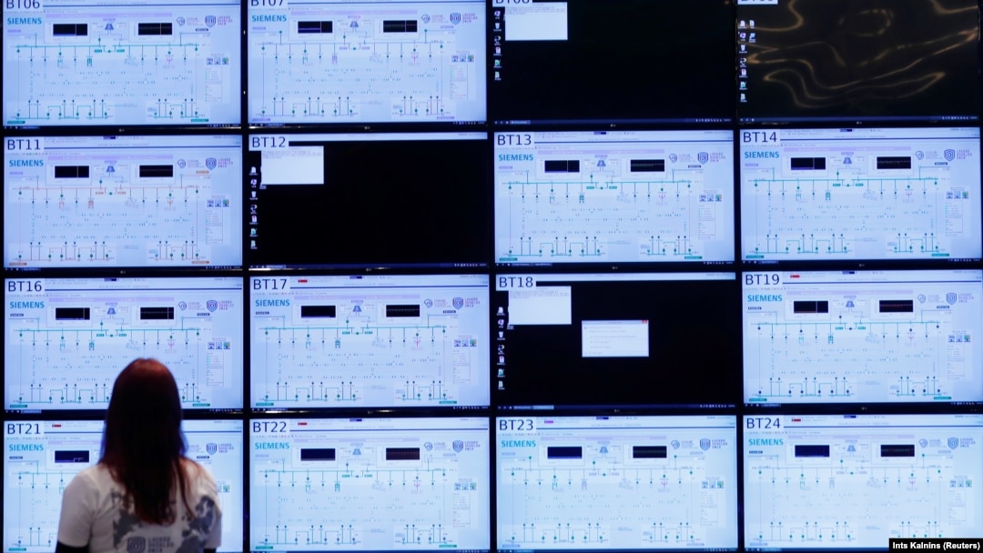  A woman looks at screens during a NATO cyberdefense exercise in Estonia in 2019. 