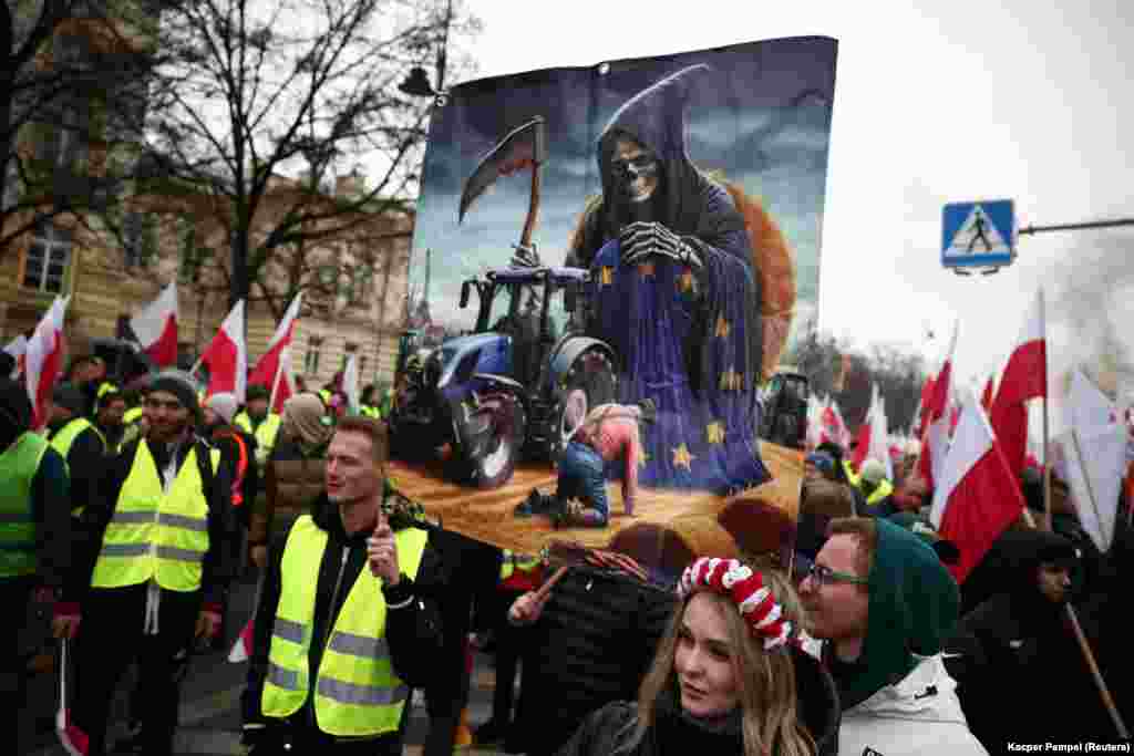 Marchers outside the office of Polish Prime Minister Donald Tusk in Warsaw on March 6.&nbsp; The Polish protesters are calling for an end to restrictions and expenses imposed on them by the EU&#39;s Green Deal, a plan to tackle climate change.&nbsp;