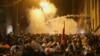 Tens of thousands of protesters have taken to the streets of Tbilisi and other cities over the controversial "foreign agent" bill approved by parliament.