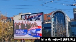Aleksandar Vucic appears on Serbian Progressive Party billboards ahead of the December 17 elections in Belgrade.