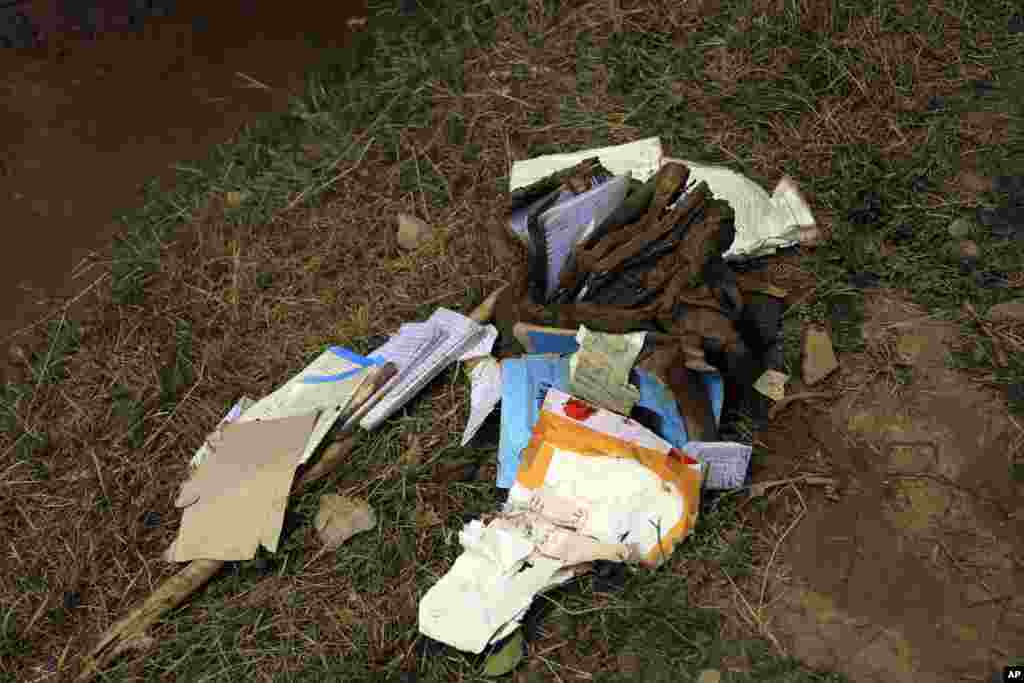 Children&#39;s waterlogged schoolbooks The flash floods have partially or completely damaged 606 residential houses, as well as hundreds of acres of farmland, Rahimi said.
