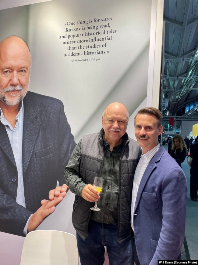 Andrey Kurkov (left) and publisher Will Evans at the Frankfurt Book Fair in October.