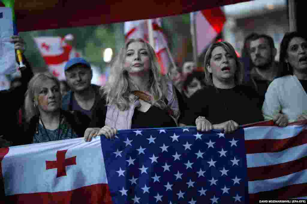 Georgian protesters march against a draft &quot;foreign agent&quot; law in Tbilisi.