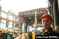 Ihor stands in the generator block at the power plant, its roof overhead ripped open by the latest Russian shelling.