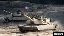 საილუსტრაციო ფოტო: აშშ-ის არმიის M1A1 Abrams-ები წვრთნისას ლატვიაში. ადაზი, 26 მარტი, 2021