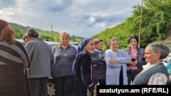 Armenia - Residents of Kirants village block a road,