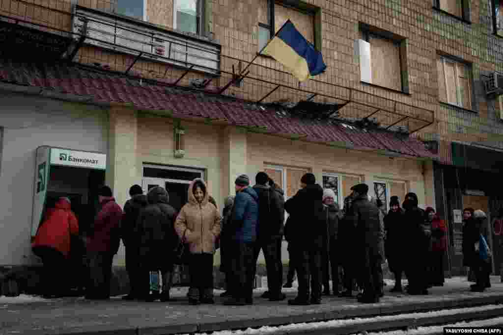 As shops only accept cash, people must line up at one of the only two functioning ATMs. One of those waiting is 47-year-old customs officer Oleksandr Tymoshenko, who says he&#39;s not concerned about a Russian offensive. &quot;I spoke with the military and they said: &#39;Don&#39;t worry about it. The situation is under control.&#39;&quot;