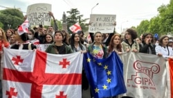 Students protest in Tbilisi against the "foreign agents" bill in parliament on May 13. 