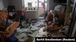 Cameră distrusă dintr-un bloc de apartamente avariat de o lovitură cu dronă rusă, pe fondul atacului Rusiei asupra Ucrainei, Odesa, Ucraina, 10 iunie 2023.