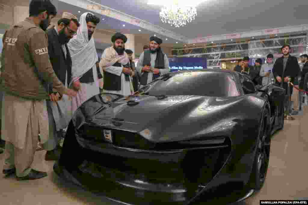 The Black Swan, the first sports car made in Afghanistan, is showcased during an exhibition organized by the Technical Vocational Education and Innovation Center of Afghanistan, in Kabul. Muhammed Reza Ahmadi, CEO of the auto studio behind Black Swan, said the car was made entirely by the department&#39;s innovation center, with the only external part being the engine.
