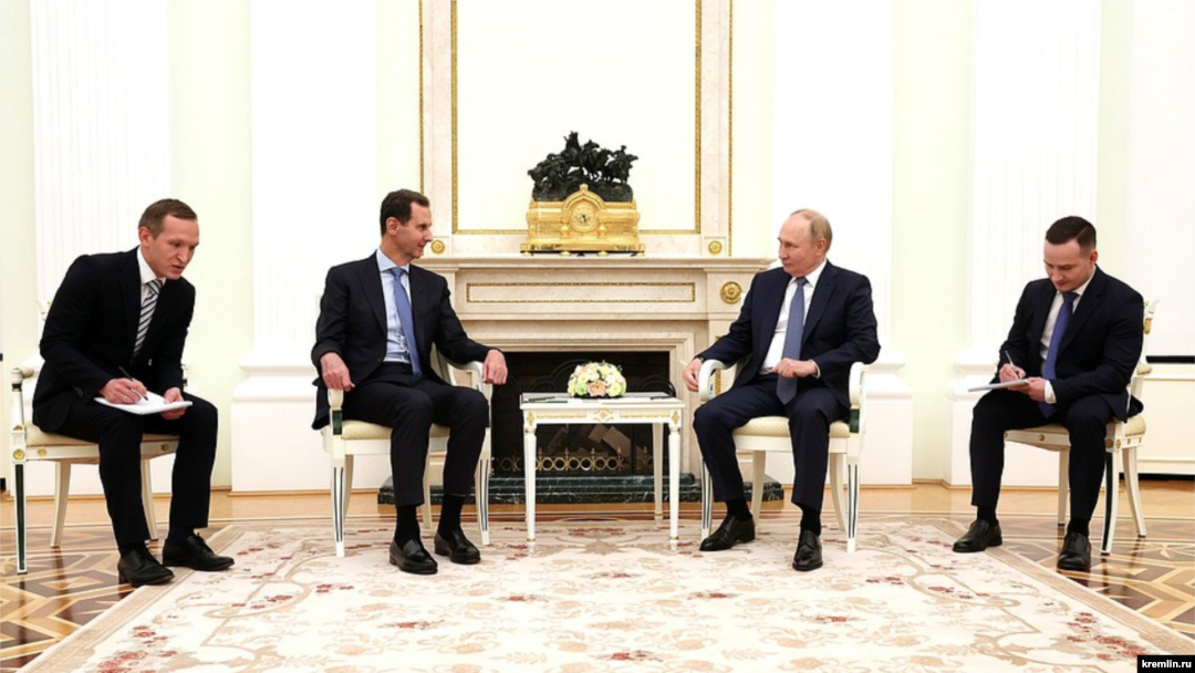 Russian President Vladimir Putin (center right) met with Syrian President Bashar al-Assad (center left) on July 25.