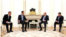 Russian President Vladimir Putin (center right) met with Syrian President Bashar al-Assad (center left) on July 25.