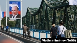Posteri dobrodošlice sa Putinovim likom u Pjongjangu, 18. juni 2024.