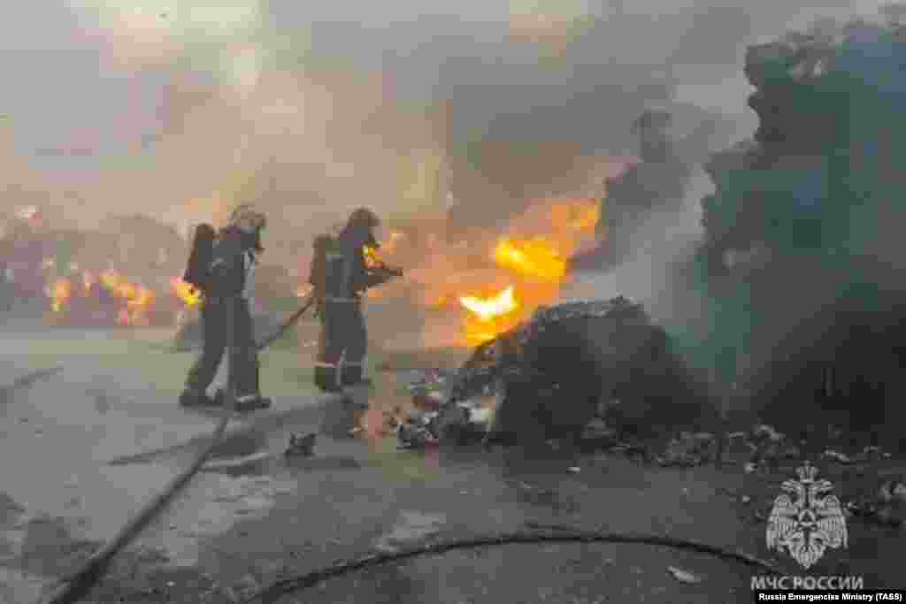 Firefighters douse flames at a paper warehouse in Aksay, in Russia&#39;s Rostov region, on July 21.&nbsp;&nbsp;