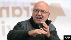 Since Russia invaded Ukraine last year, there has been a surge of interest in the West in Ukrainian artists and writers, such as Andrey Kurkov, who is pictured here speaking at an event held as part of the Frankfurt Book Fair in October. 