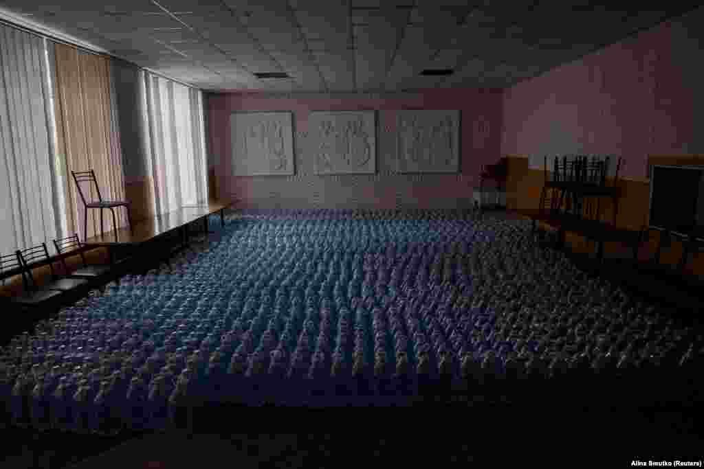 A room full of water bottles. The draining of the Kakhovka reservoir has led to water rationing for residents such as villagers in&nbsp;Hrushivka, in the Dnipropetrovsk region, who now depend on bottled water. &nbsp;