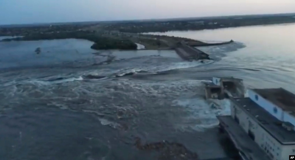 A still from a video shot by a drone on June 6 over the dam of the Kakhovka Reservoir