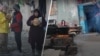 Фотоколаж: штучний голод у Маріуполі, створений військом РФ навесні 2022 року