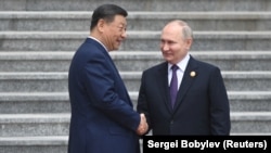 Президент России Владимир Путин и председатель Китая Си Цзиньпин. Пекин, 16 мая 2024 года