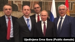 Ruski predsednik Vladimir Putin sa crnogorskim političarima Andrijom Mandićem, Milanom Kneževićem i Goranom Danilovićem, januar 2019.