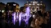 UKRAINE -- People take pictures near the Opera Theatre in Lviv, Ukraine, 04 September 2023