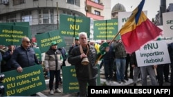 Romanian farmers protest in front of the European Commision headquarters in Bucharest on April 7.